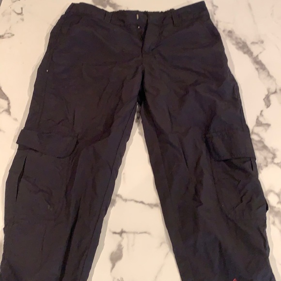 These are black cargo pants from ninth hall. size small, comfortable ,100% nylon - Picture 1 of 5
